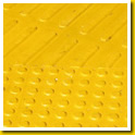 Yellow Stikcrete tactiles inset in path